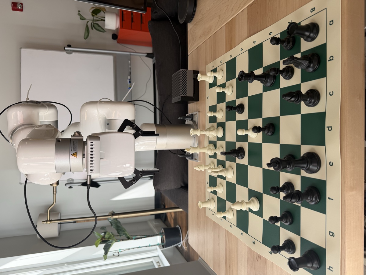The UFactory xArm set up next to a chess board, ready to play